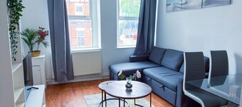 Charity Suite | Modern 1BR • Sleeps 4 • Wi-Fi