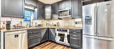 Royal Room, 1 Queen Bed | Private kitchen | Shared fridge, microwave