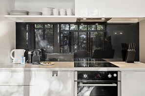 Apartment | Private kitchen | Cookware/dishes/utensils - Bright Inner-north Stay With Pool Access (Melbourne)