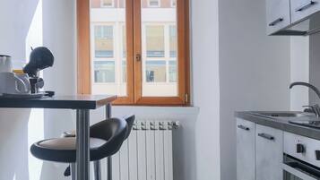 Oven, espresso maker, coffee/tea maker, cookware/dishes/utensils