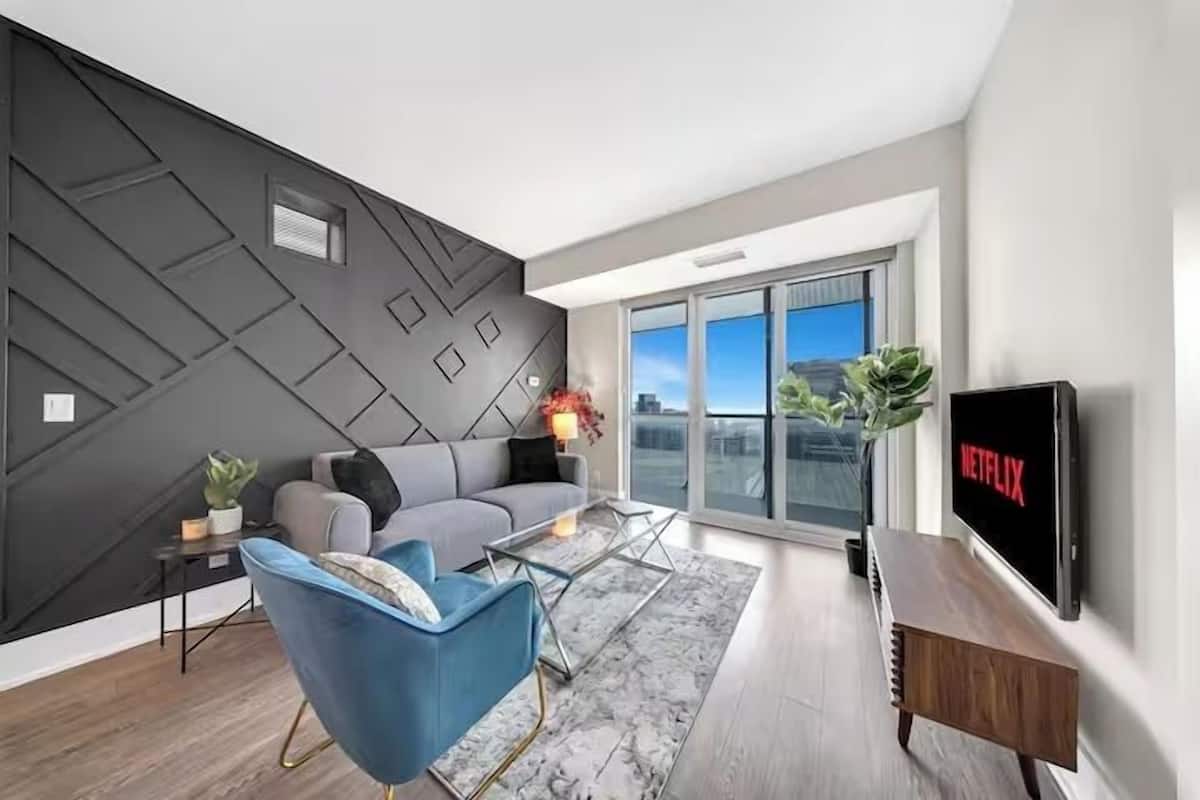 Design Apartment, City View | Living area | 50-inch Smart TV with digital channels, Netflix, streaming services