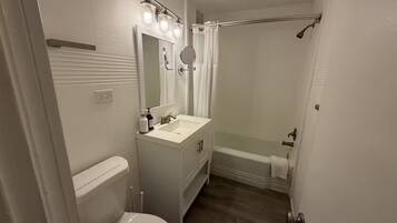 Hair dryer, towels, soap, toilet paper