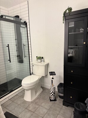 Shower, hair dryer, towels, soap