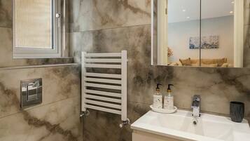 Hair dryer, bidet, towels, soap