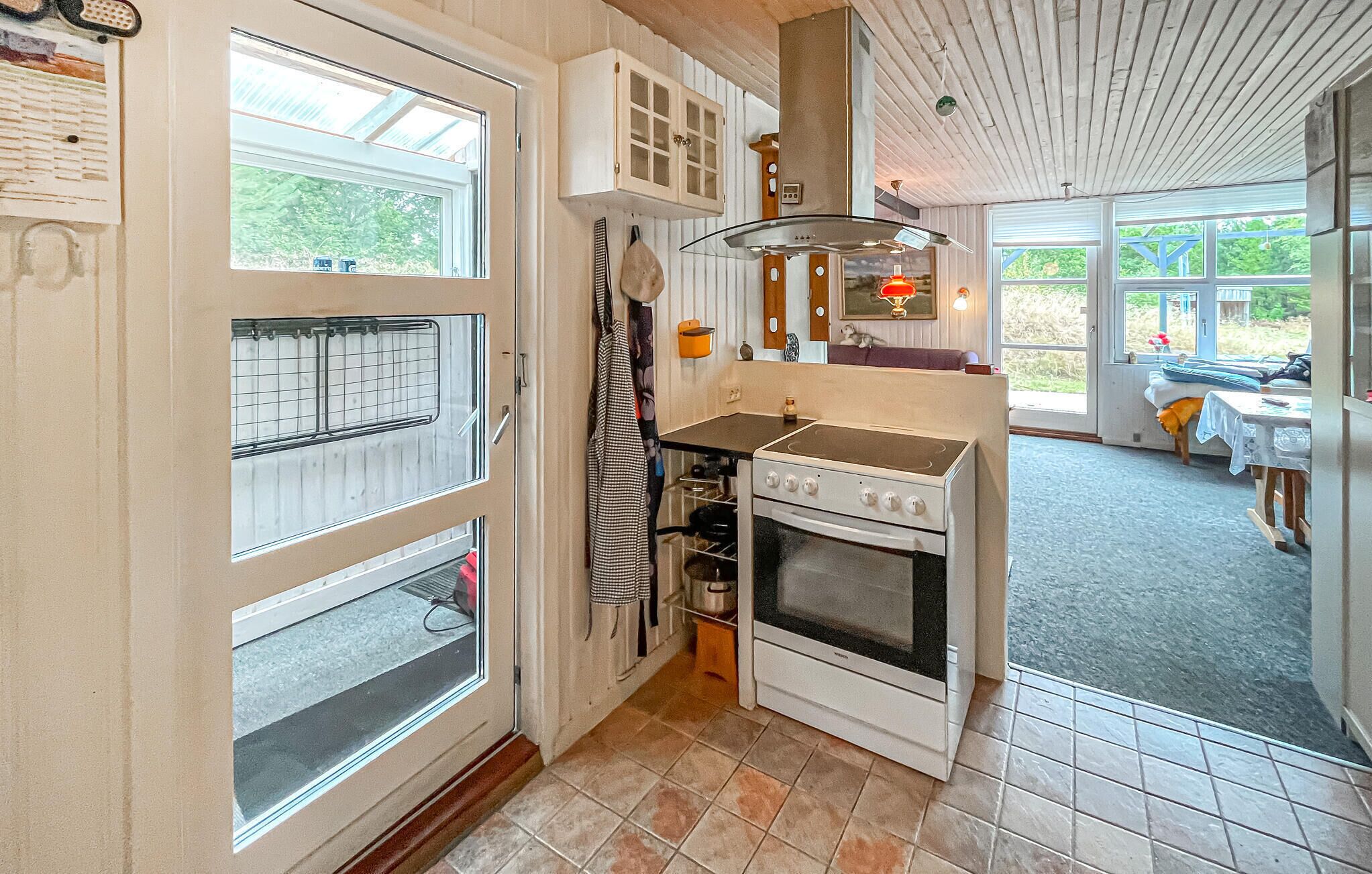 Fridge, stovetop, dishwasher, coffee/tea maker