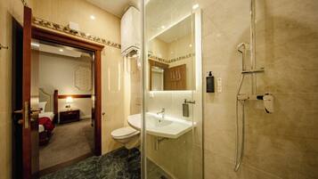 Premium Quadruple Room, Balcony, Park View | Bathroom | Shower, hair dryer, slippers, towels