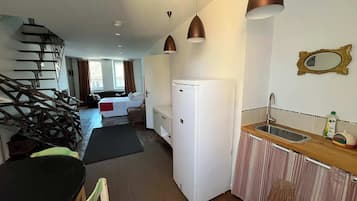 1 slaapkamer, een strijkplank/strijkijzer, wifi, beddengoed
