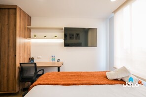 Basic Loft, Garden View | Living area - Tribeca Park by Jalo (Bogotá)