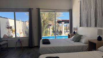 Deluxe Double Room, Partial Sea View | Desk, laptop workspace, free WiFi