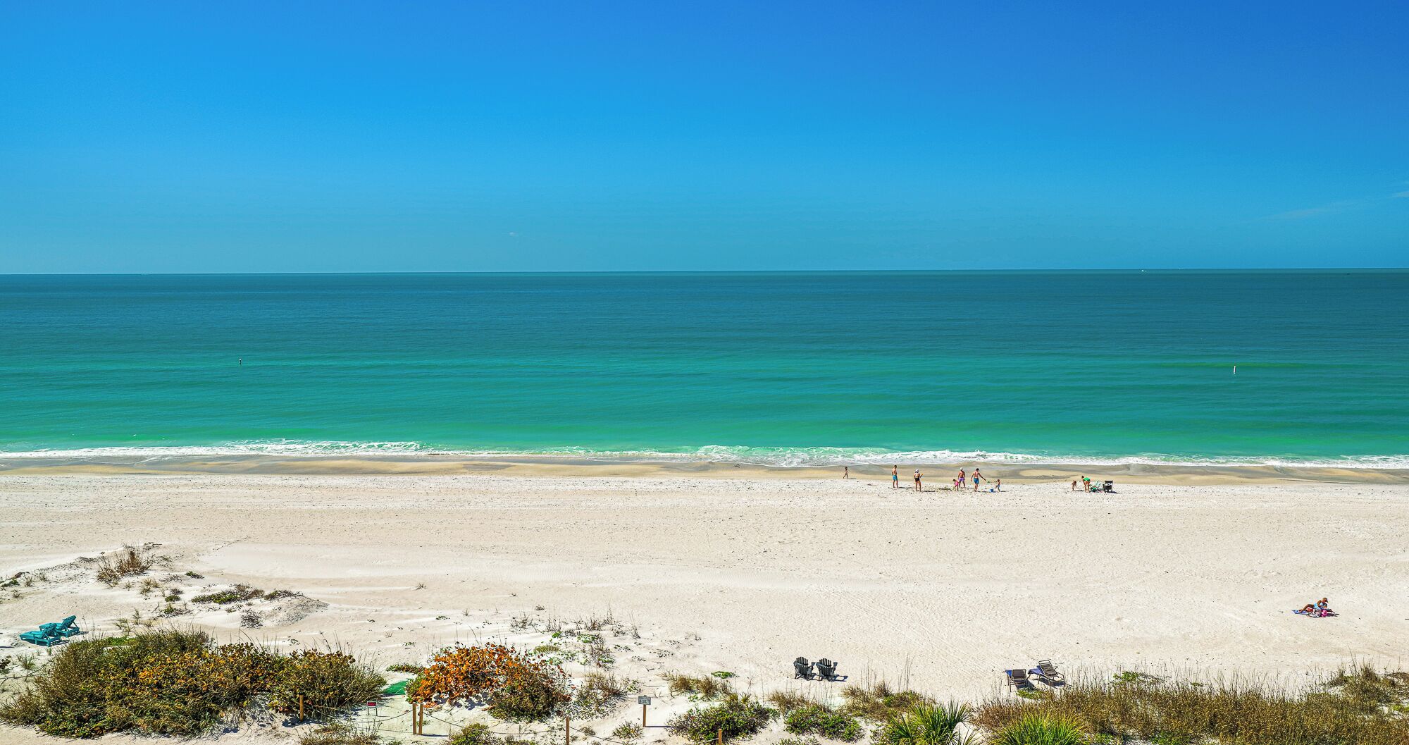 On the beach, sun loungers, beach towels