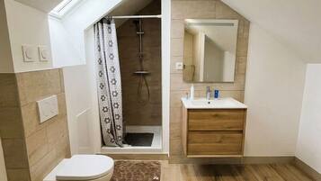 Shower, hair dryer, towels, soap