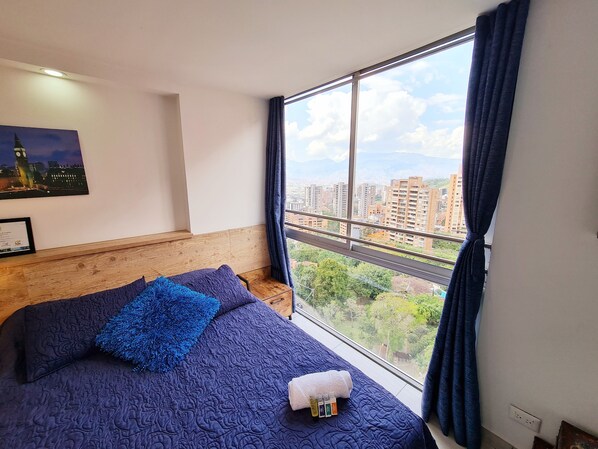 Apartment, 1 Bedroom, City View | Desk, laptop workspace, blackout drapes, iron/ironing board - Staynova Acogedor Loft en El poblado (Medellín)