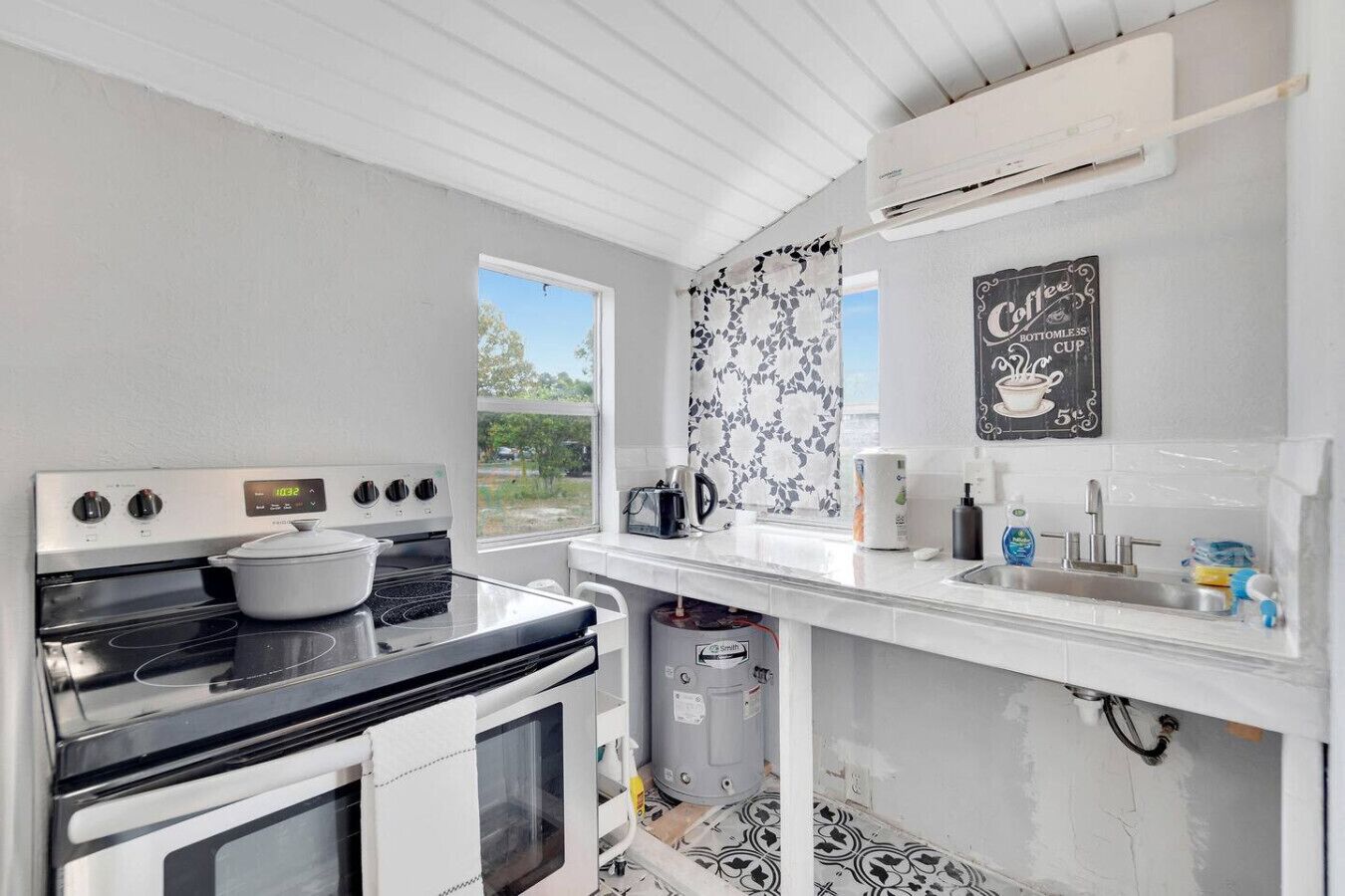 Microwave, coffee/tea maker, toaster, cookware/dishes/utensils