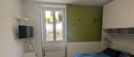 1 dormitorio, tabla de planchar con plancha, wifi gratis y ropa de cama