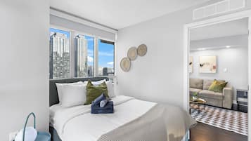 Deluxe Apartment, City View | Desk, laptop workspace, iron/ironing board, free WiFi