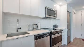 Comfort Apartment, City View | Private kitchen | Full-size fridge, microwave, oven, stovetop
