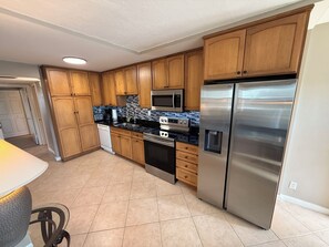 Fridge, microwave, oven, stovetop - 2-bedroom Ground Floor Condo in Peaceful Olde Marco Island (Marco Island)