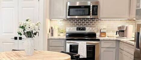 Fridge, microwave, dishwasher, coffee/tea maker