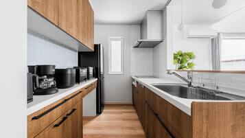 Apartment | Private kitchen | Fridge, microwave, stovetop, dishwasher