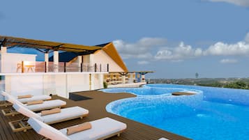 Outdoor pool, pool umbrellas, pool loungers