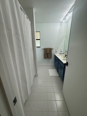 Hair dryer, towels, soap, toilet paper