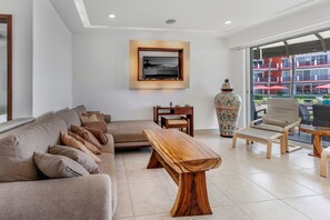 Living area - 3-bedroom Condo with AC, WiFi, Ocean Views, Tennis court & Gym in Vivo resorts (Bajos de Chila)