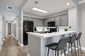 Private kitchen - SUPER modern lake condo-Fireworks view! (Orlando)