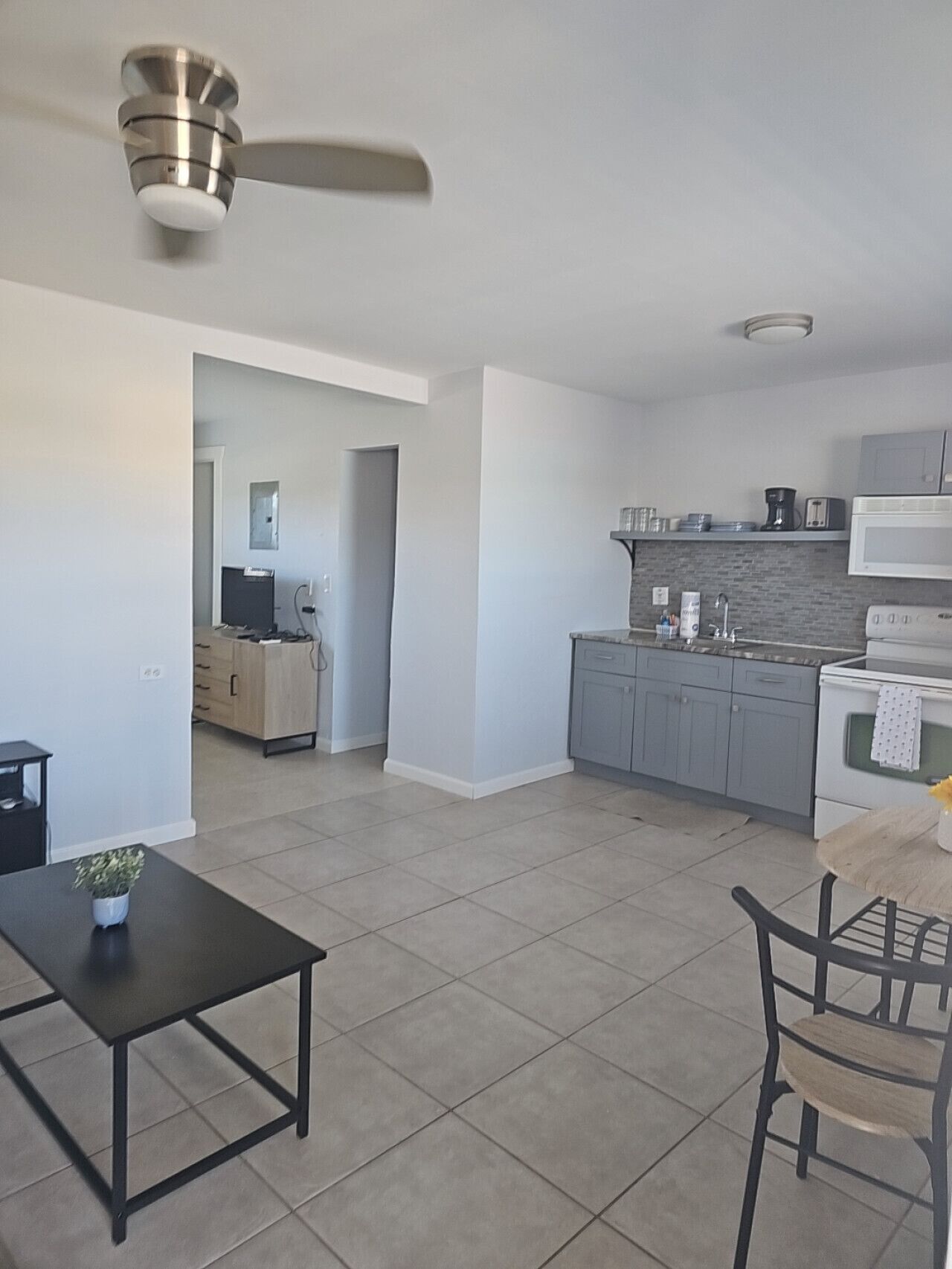 Fridge, microwave, stovetop, coffee/tea maker