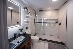 Shower, hair dryer, towels, soap