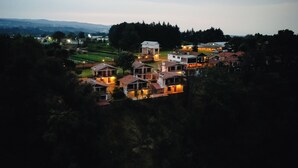 A residential area with houses, some with visible balconies and a few with attached garages.