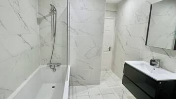 Hair dryer, towels, soap, toilet paper