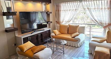 Family Apartment 3 bedrooms and bathrooms in front of the park in central area