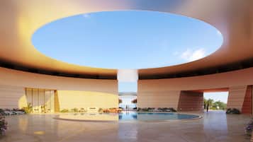 Outdoor pool, open 6:00 AM to 9:00 PM, cabanas (surcharge)