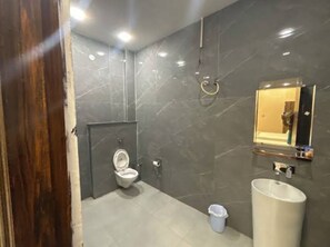 Shower, towels, soap, toilet paper