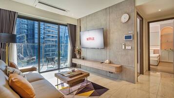 Luxury Apartment, 2 Bedrooms, Kitchen, City View | Living area | 55-inch Smart TV with digital channels