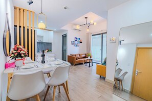 Deluxe Apartment, 2 Bedrooms, City View | Living area - MASTERI Premier Residence (Thao Dien)