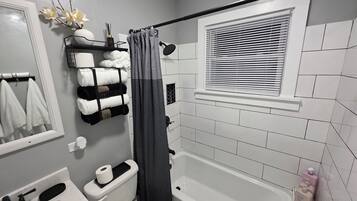 Hair dryer, towels, soap, toilet paper