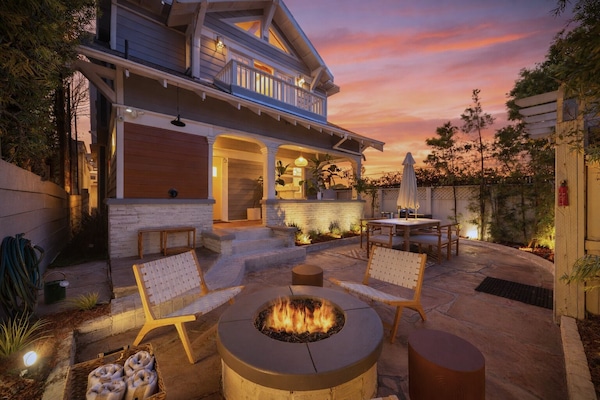 Golden-hour fire pit hangs in your private outdoor oasis.
