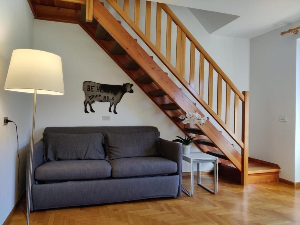 Apartment, Balcony, Mountain View | Living area | 23-inch Smart TV with cable channels