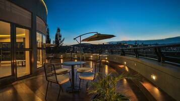 Deluxe Single Room, City View | Terrace/patio