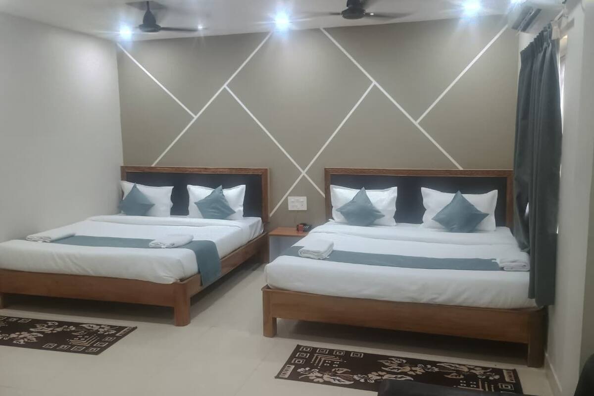 Deluxe Quadruple Room, Balcony, City View