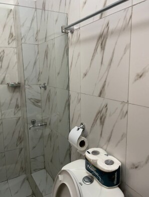 Shower, towels, soap, toilet paper - Stylish 1BR retreat in TRM Drive, Nairobi with modern comfort and serene vibes. (Nairobi)