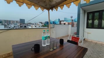 Deluxe Double Room, City View | Outdoor dining