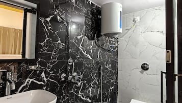 Shower, slippers, towels, soap