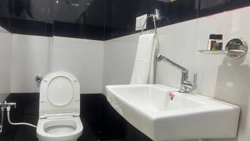 Shower, free toiletries, towels, soap