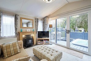 TV, fireplace, offices - Host & Stay | Country Cabin Lodge (Pocklington)