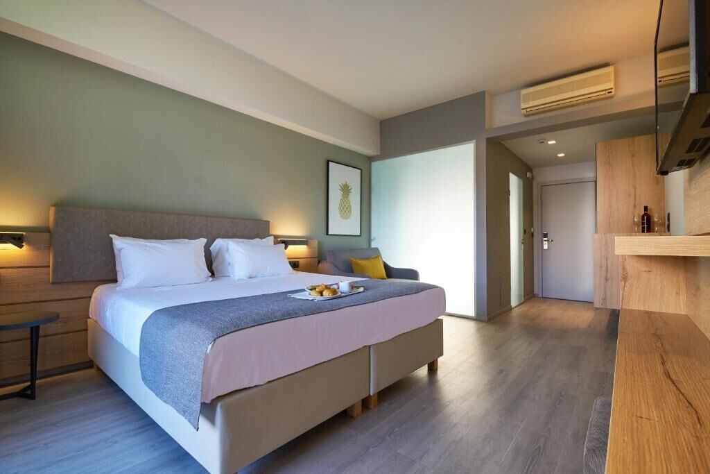 Deluxe Double or Twin Room, Pool View | In-room safe, blackout drapes, free WiFi