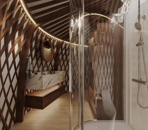 A modern bathroom with a wooden sloped ceiling, a built-in sink, and a shower enclosure. - Big Sky Lodge (Ulaanbaatar)