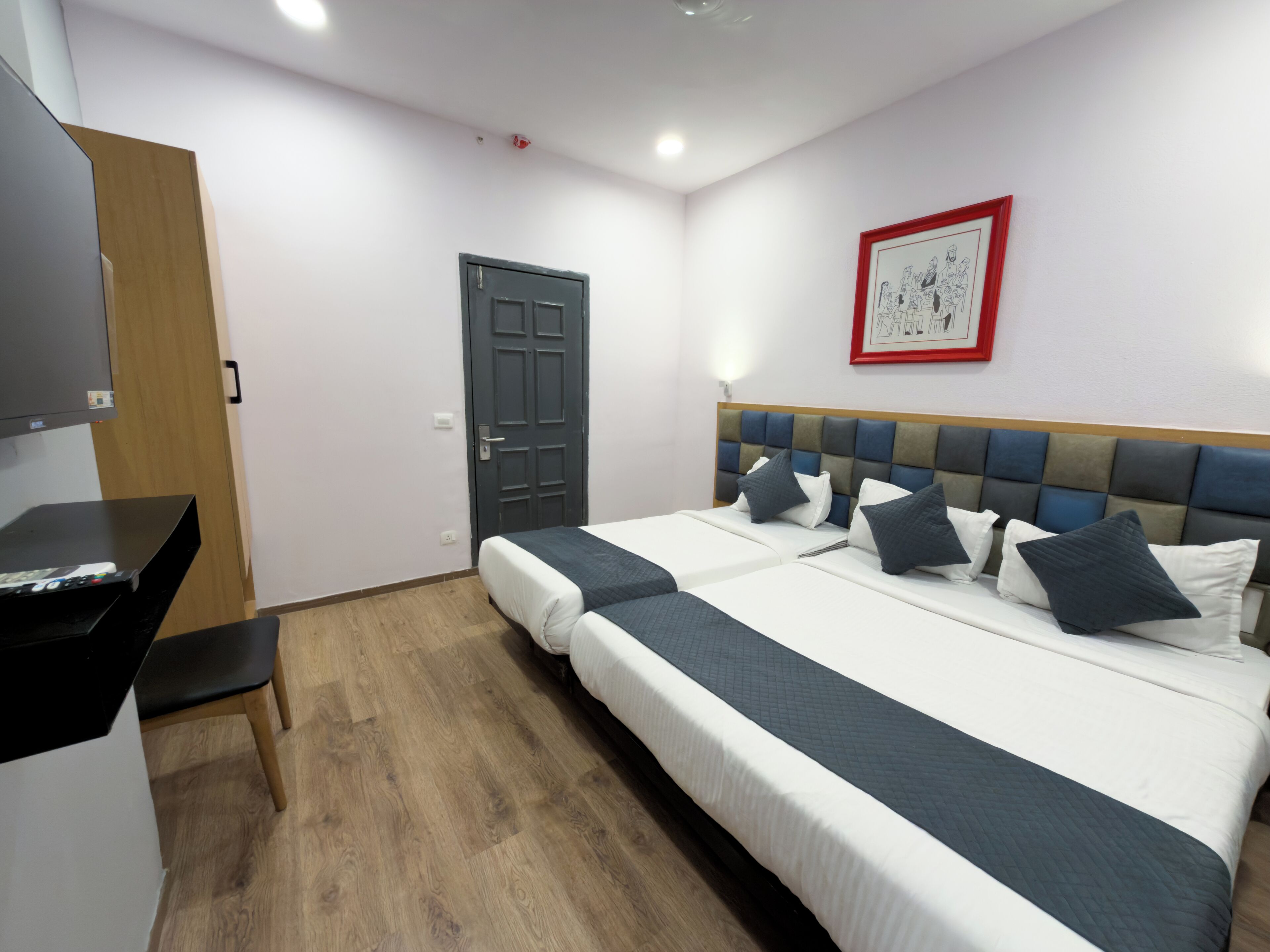 Deluxe Triple Room | Iron/ironing board, free WiFi