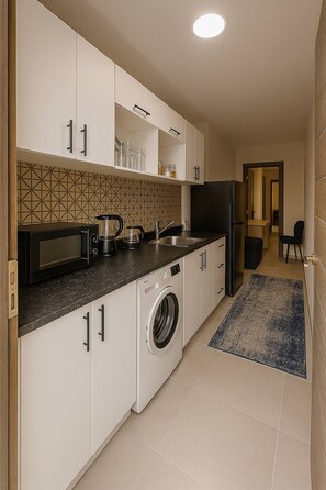 Habitación, 1 habitación, con acceso para personas discapacitadas, alberca privada | Lavandería